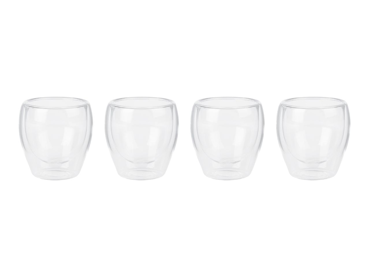 Four clear double-walled glass cups arranged in a row on a white background.