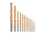 A set of golden-colored drill bits of various sizes, arranged from largest to smallest.