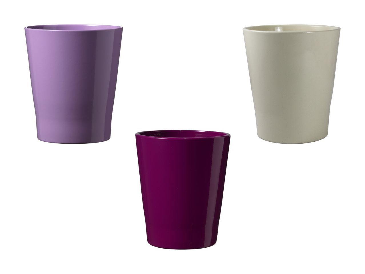 Tre vasi per fiori in plastica, colori pastello.