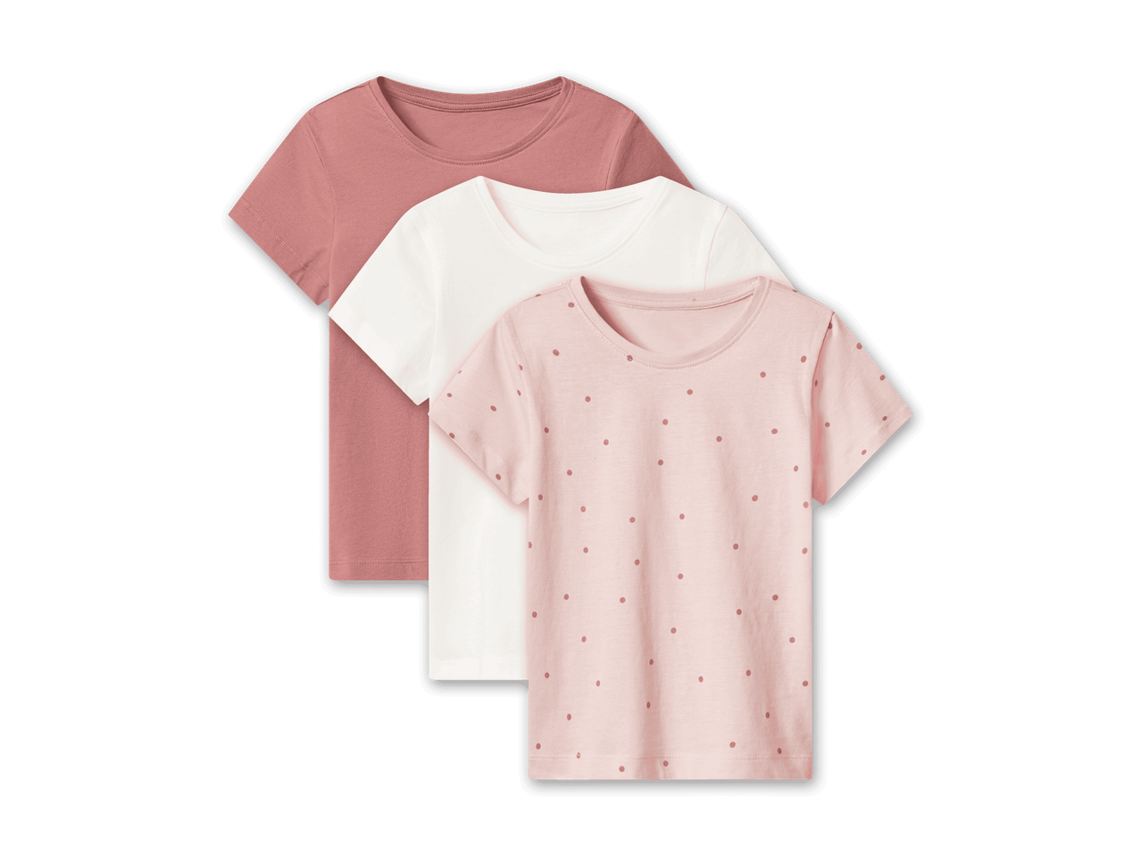 Drei T-Shirts in Rosa, Weiß und Hellrosa mit Punkten, übereinandergelegt.