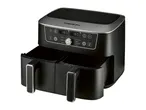 Black dual-basket air fryer with digital display showing 180°C and various cooking functions.
