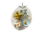 Green olives, feta cheese, and wooden skewers on a wooden board.