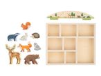 Wooden forest animal figures including a deer, bear, fox, badger, squirrel, rabbit, hedgehog, and owl, with a wooden display shelf and a decorative forest-themed top piece.