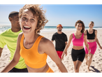 Summer sportswear: tops, leggings, and shorts at the beach.