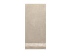 Beige towel with a decorative floral border.