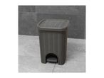 Grey rattan-style pedal bin with a textured lid on a tiled floor.