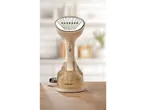 Escova a vapor Silvercrest® numa mesa de madeira, com cozinha desfocada ao fundo.