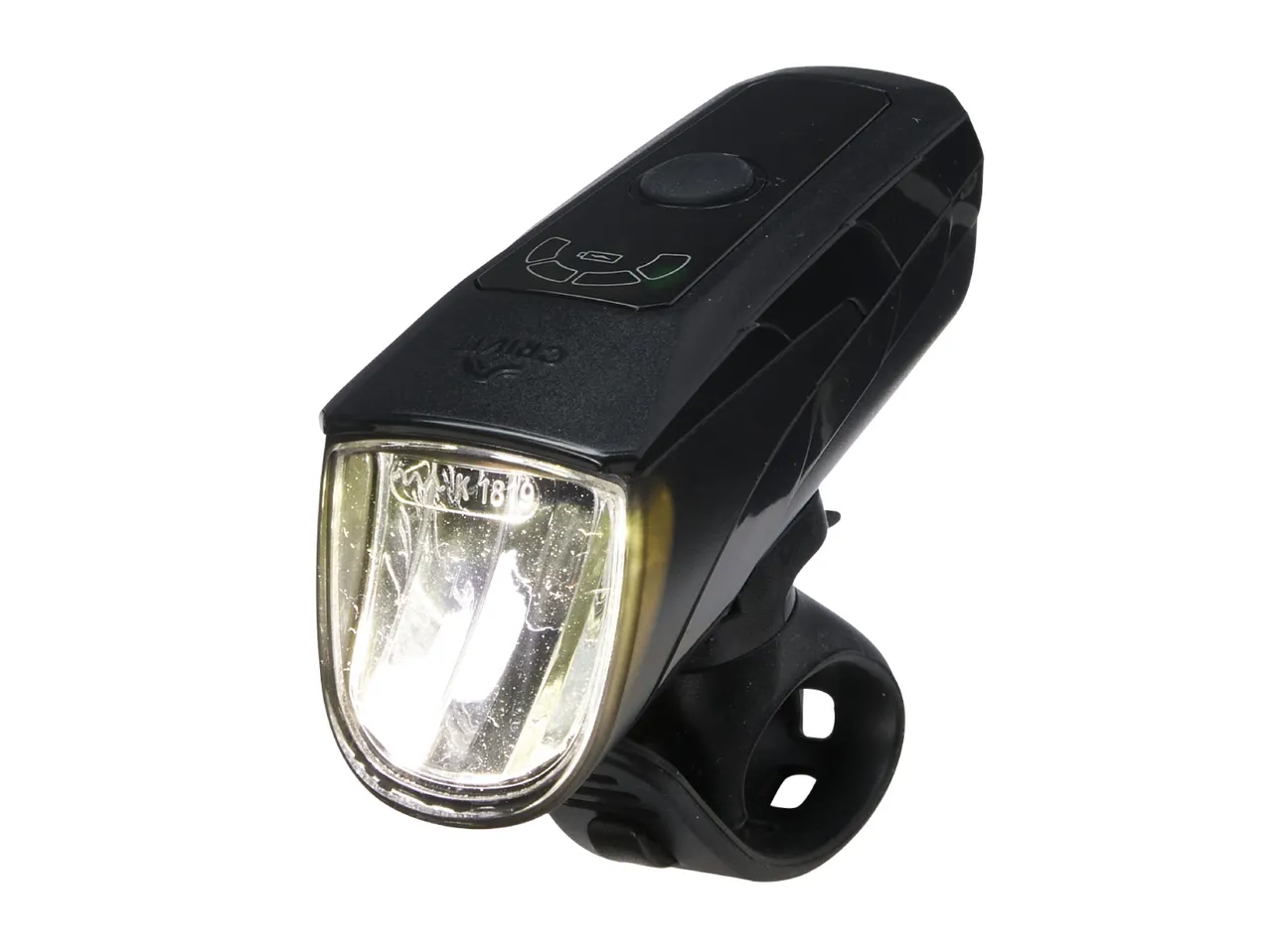 Black bicycle headlight with a clear lens and a visible power button on top.
