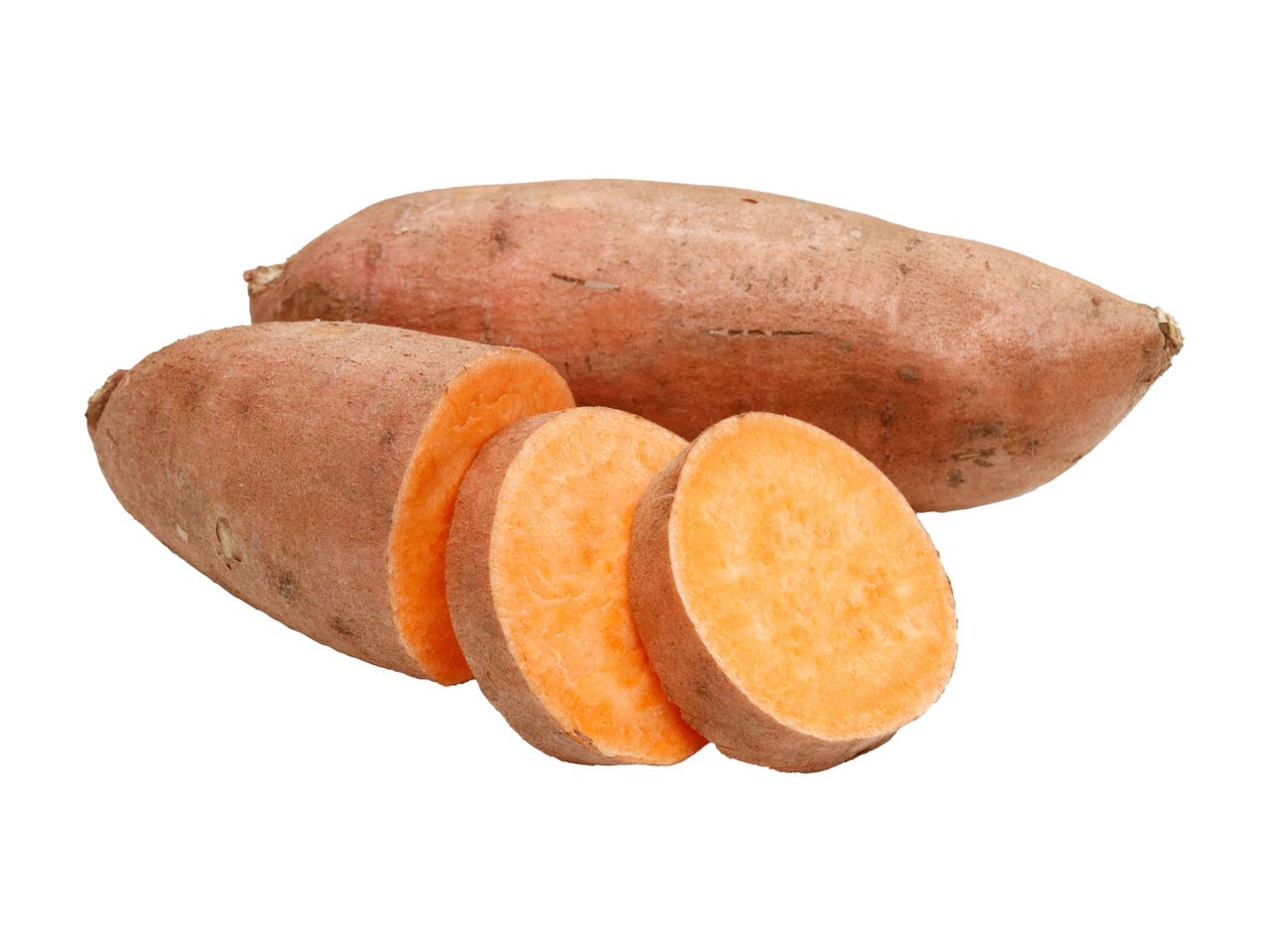 Whole and sliced sweet potatoes with orange flesh