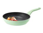 Light green frying pan with vegetables inside
