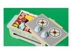 Wooden toy kitchen with stove, oven, and play food pieces like shrimp, corn, and fish.