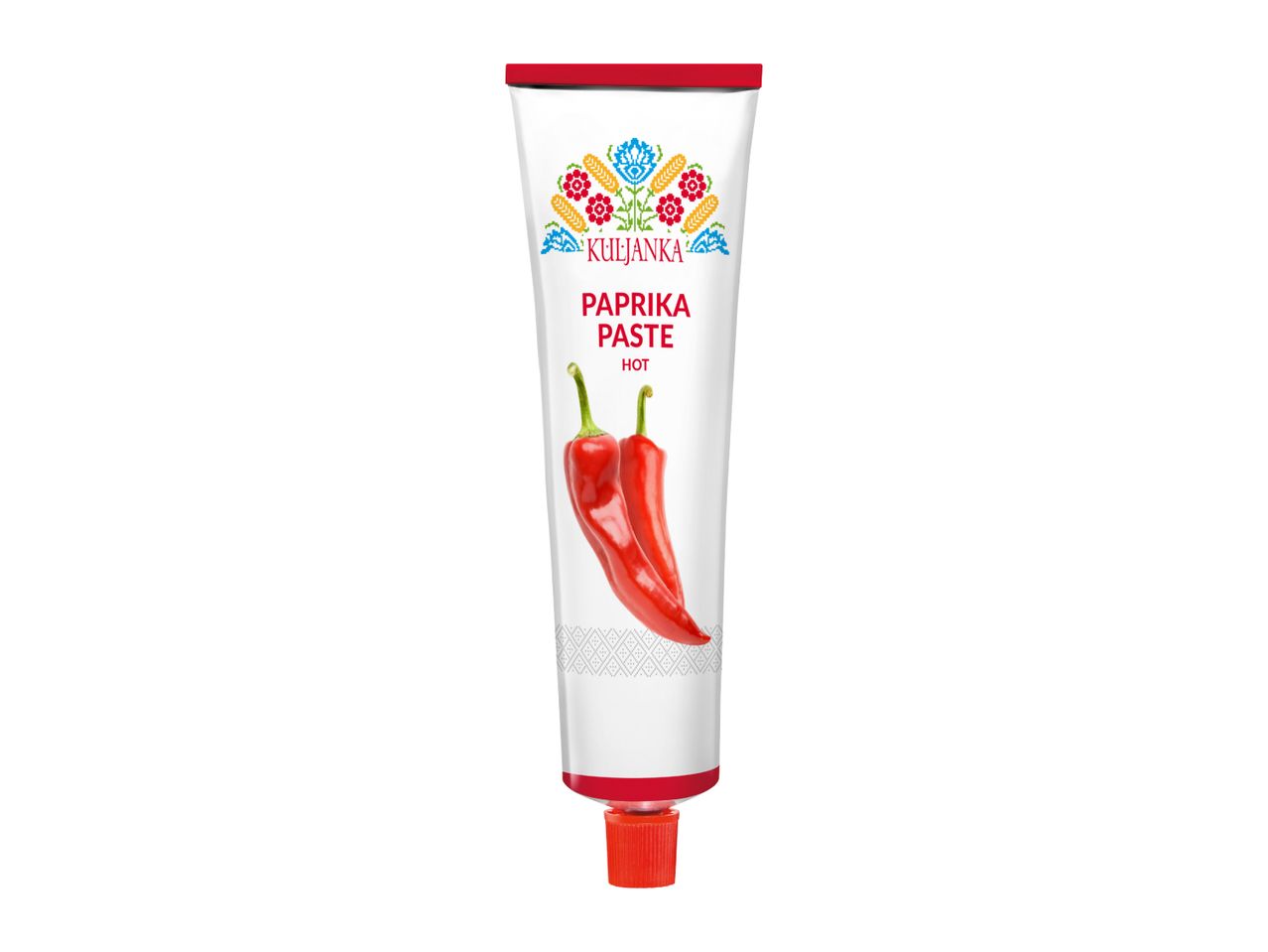 White tube of hot paprika paste with red chili peppers and folk art design.
