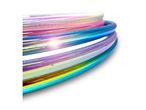 Stack of iridescent hula hoops with a bright light reflection.