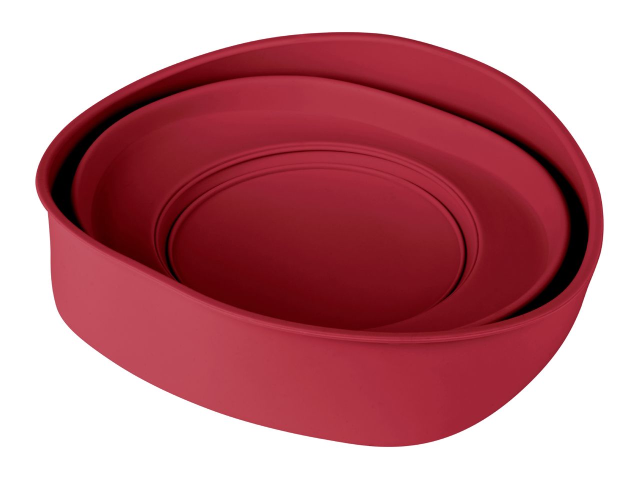Three nested red silicone bowls on a white background.
