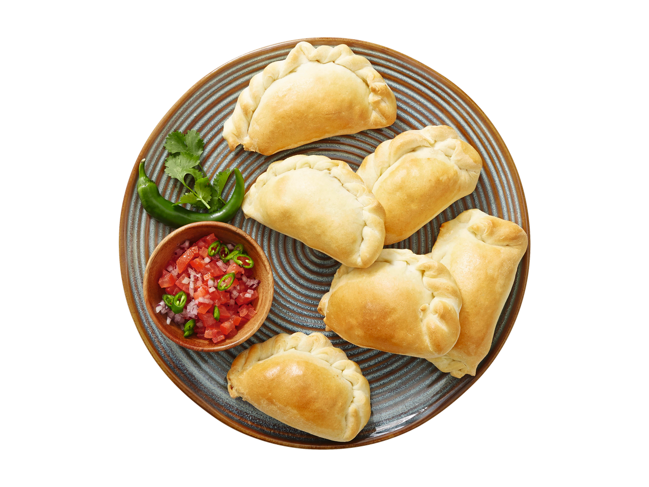 Empanadas and salsa on a plate.