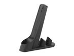 A black plastic gun magazine holder.