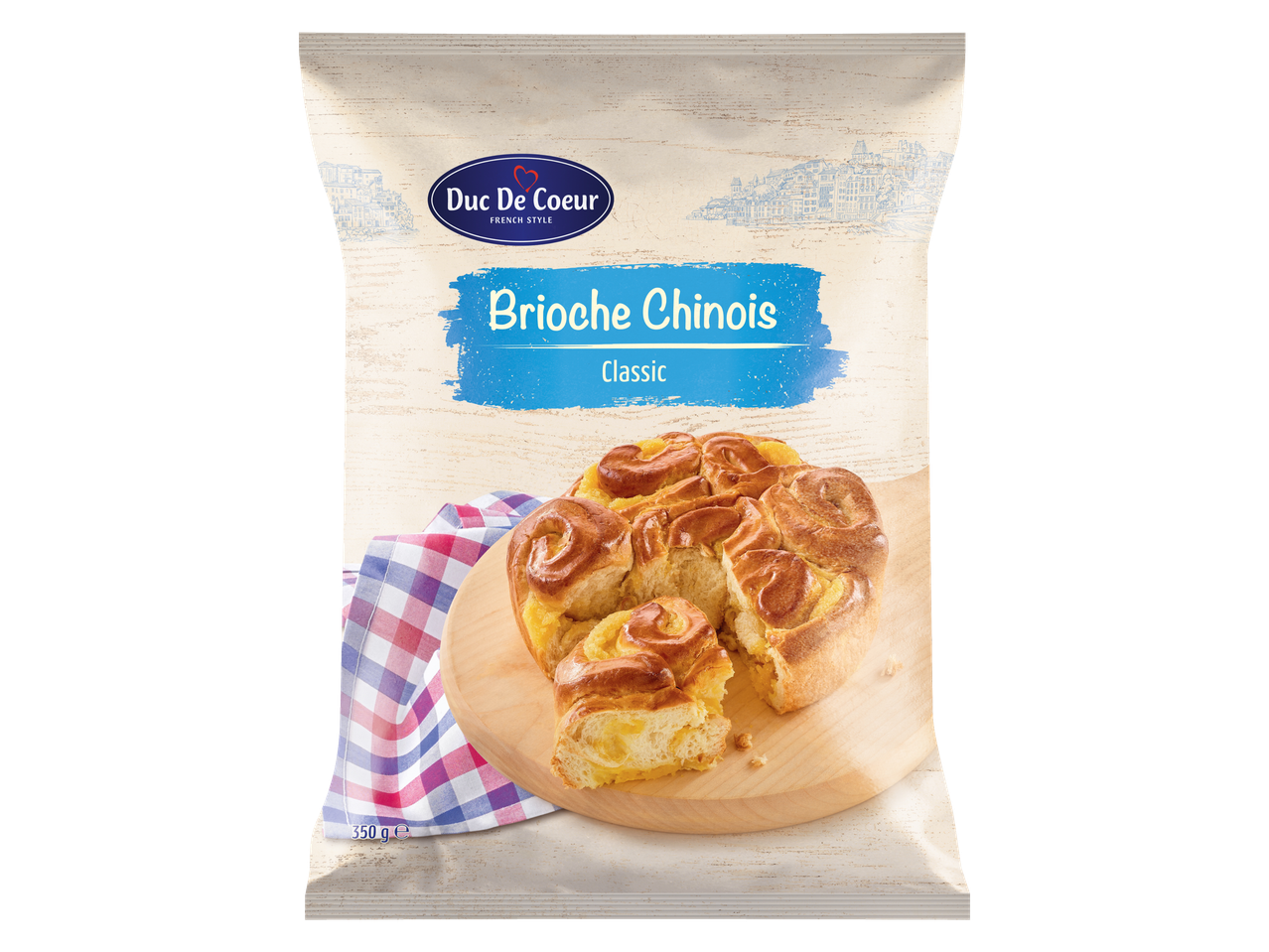 Duc De Coeur Brioche Chinois verpakking met een gesneden brioche op een houten plank.