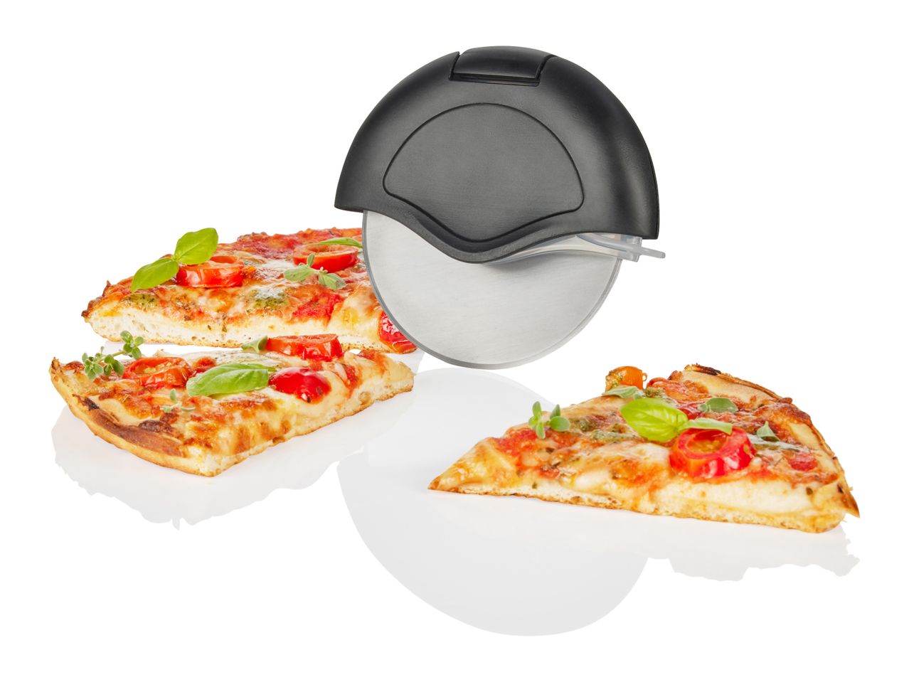 Pizza with mozzarella and cherry tomatoes, pizza cutter.