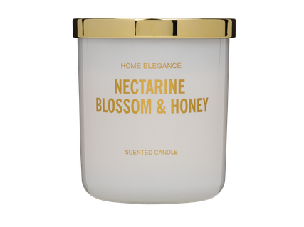 Kvepianti žvakė stiklinėje