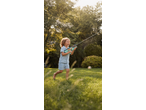Lupilu Electric Water Pistol in action, a child playing barefoot in the grass.