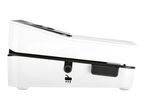 Side view of a white vacuum sealer with a black button and arrows indicating airflow.