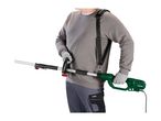 Person holding a long-reach hedge trimmer with a shoulder strap