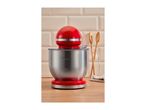 Red stand mixer with a stainless steel bowl on a wooden countertop
