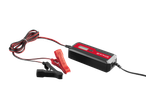 Punjač baterija Ultimate Speed sa crvenim i crnim štipaljkama i kablovima.