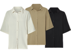 Tre kortärmade skjortor i ljusbeige, khaki och svart.