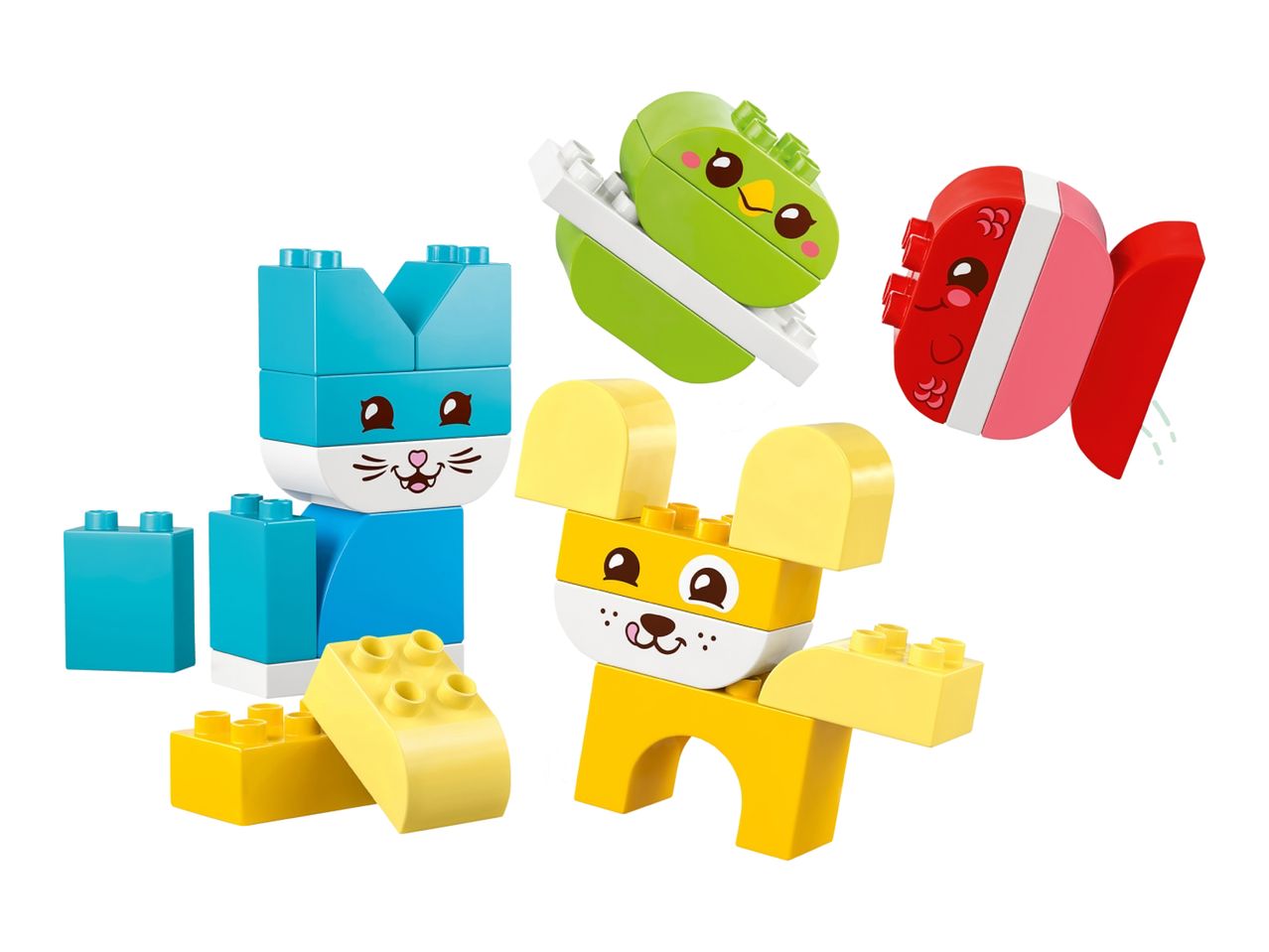 Colorful building blocks shaped as a blue cat, yellow dog, green bird, and red fish.