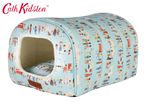 Cath Kidston pet bed with a London-themed print featuring people, buses, and landmarks.