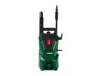 Green and black pressure washer with a red power dial and hose attachments.