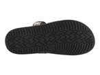 Bottom view of a black sandal with a patterned sole and snakeskin-like strap.