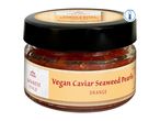 Jar of Japanese-style vegan caviar seaweed pearls in orange flavor, labeled as chilled.