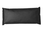 Black rectangular non-woven fabric bag, possibly containing activated charcoal or a similar absorbent.