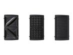 Three interchangeable plates for a sandwich maker: sandwich, waffle, and grill plates.