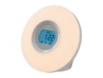 A white and grey circular wake-up light with a blue digital display showing the time 1:22.