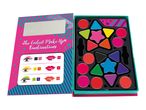 A colorful book-shaped makeup kit with various eyeshadows and lipsticks.