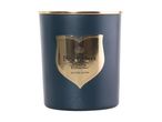 Dark Embers scented candle in a dark blue jar with a gold shield label