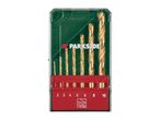A set of gold-colored drill bits in a clear and green plastic case with a red base.
