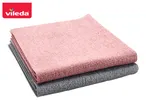 Vileda microfiber cloths in pink and gray, neatly stacked.
