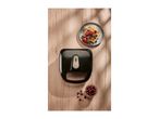 Silvercrest waffle maker with waffles and berries on a wooden table