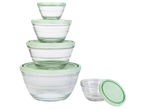 Комплект от пет стъклени купи за съхранение с ментовозелени капаци, подредени една върху друга.