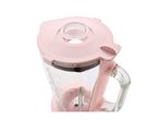 Pink blender with a glass jar and a clear lid, showing measurement markings