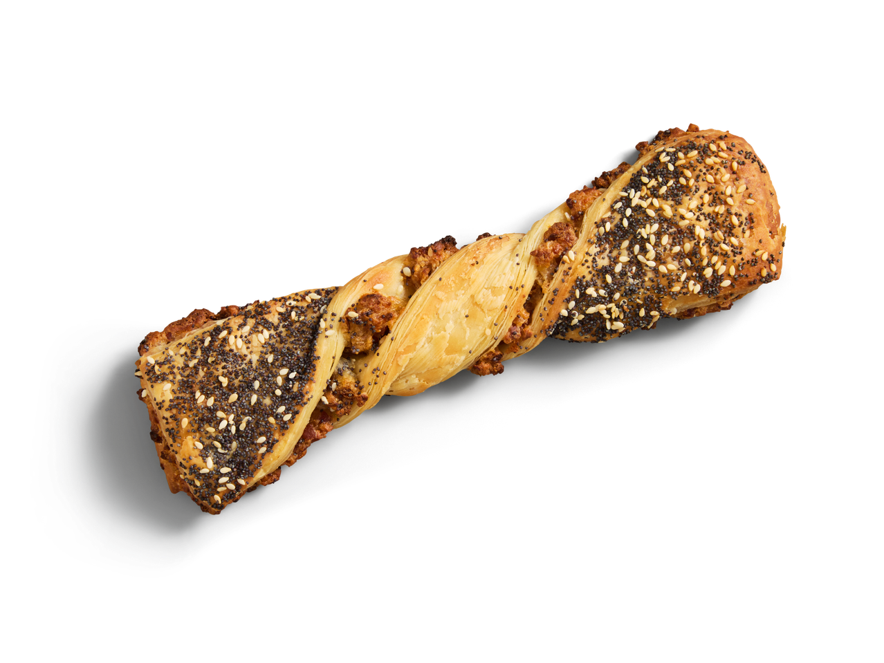 Ein gezwirbeltes Gebäck mit Mohn- und Sesamsamen liegt auf dunklem Untergrund.