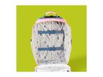 Open pink children's suitcase with a whimsical forest pattern lining and blue elastic straps.