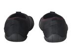 Pair of black water shoes with red stitching, seen from the back.
