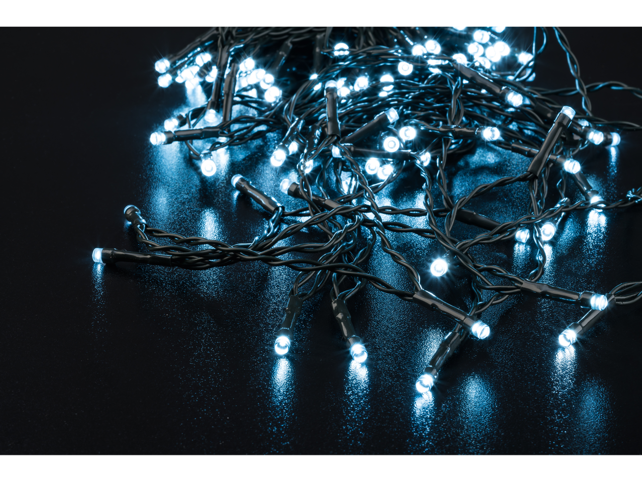 LIVARNO home 50 LED Fairy Lights, cool white glow on a dark surface.