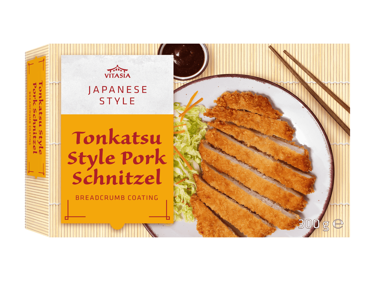 Schnitzel de porc style Tonkatsu avec panure, accompagné de salade et sauce.