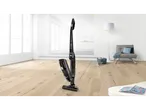 Cordless 2-in-1 vacuum cleaner in a modern, bright living room.